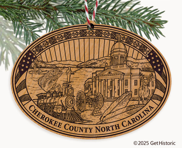 Cherokee County North Carolina Engraved Natural Ornament with engraved design of a building, train, and mountains, featuring 'Cherokee County, North Carolina'.